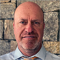 Danny Williams, Commissioner
