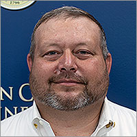 Ray Ledger, Commissioner
